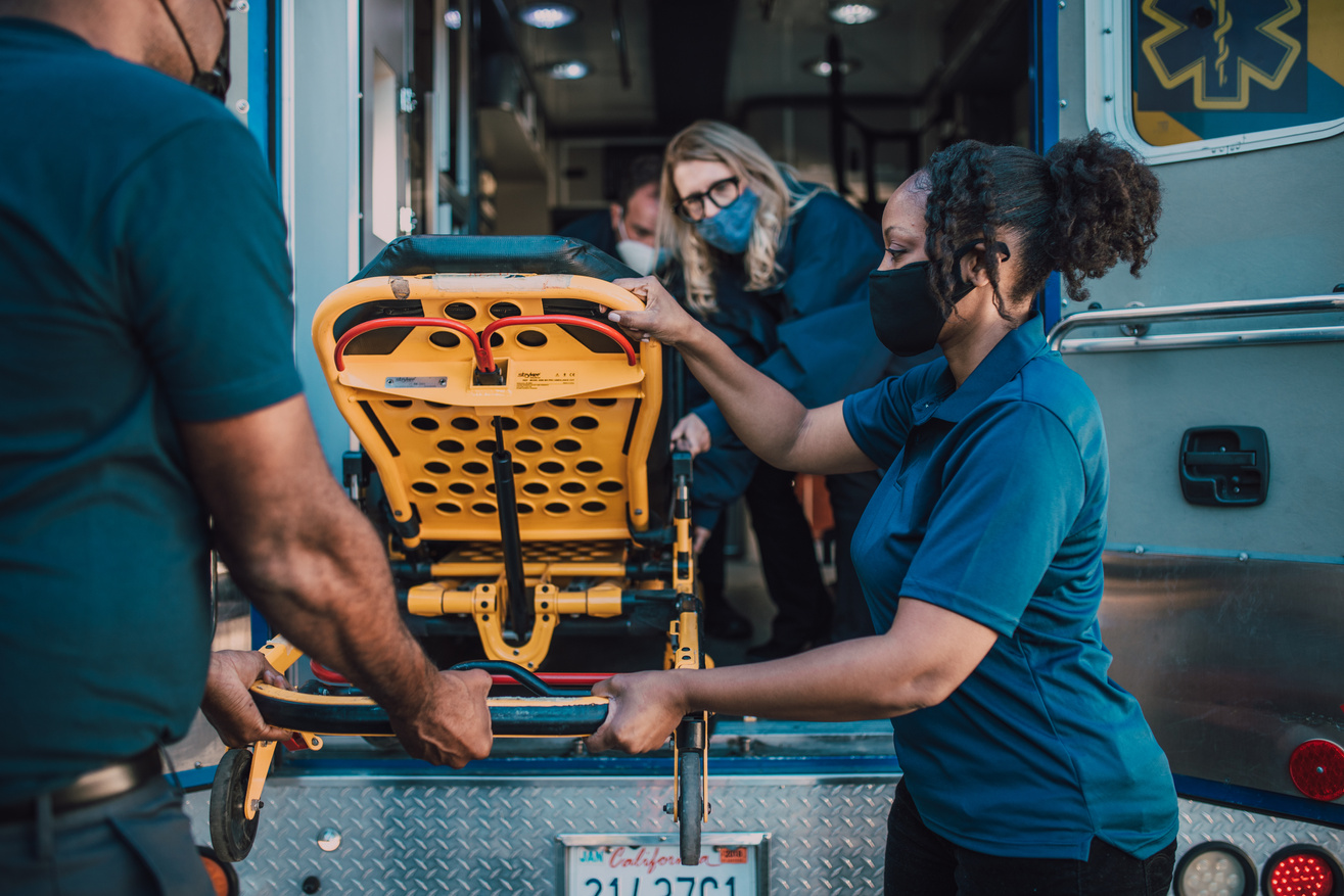 Paramedics Pulling Out a Stretcher